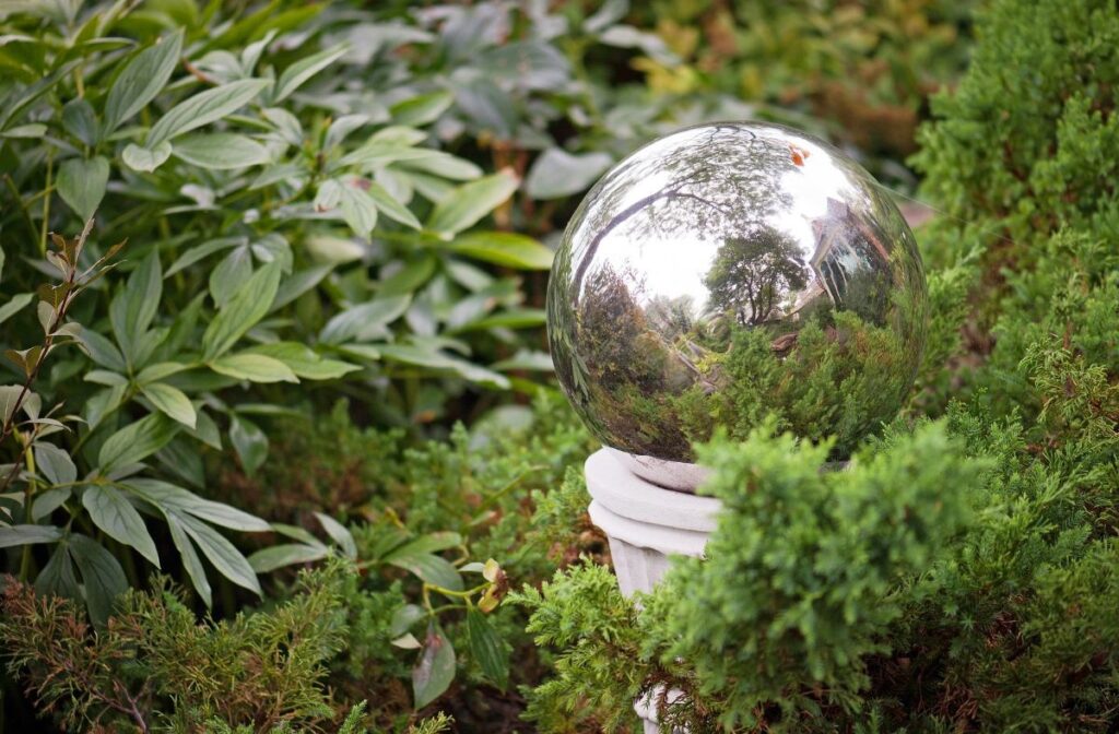 Garden Cherub Statue with Gazing Ball